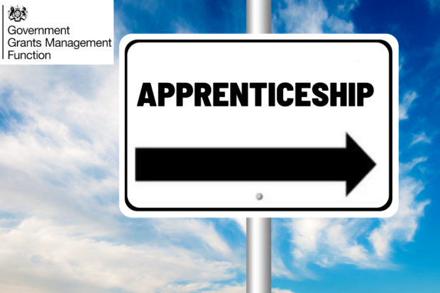 White sign with the word apprenticeship and underneath the word there is a symbol of an arrow pointing to the right. The sign is framed by a blue sky with white clouds